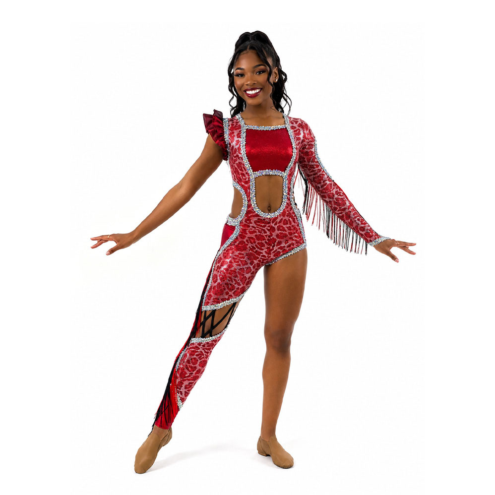 A majorette in a red fringed one-shoulder jumpsuit with mesh cutouts